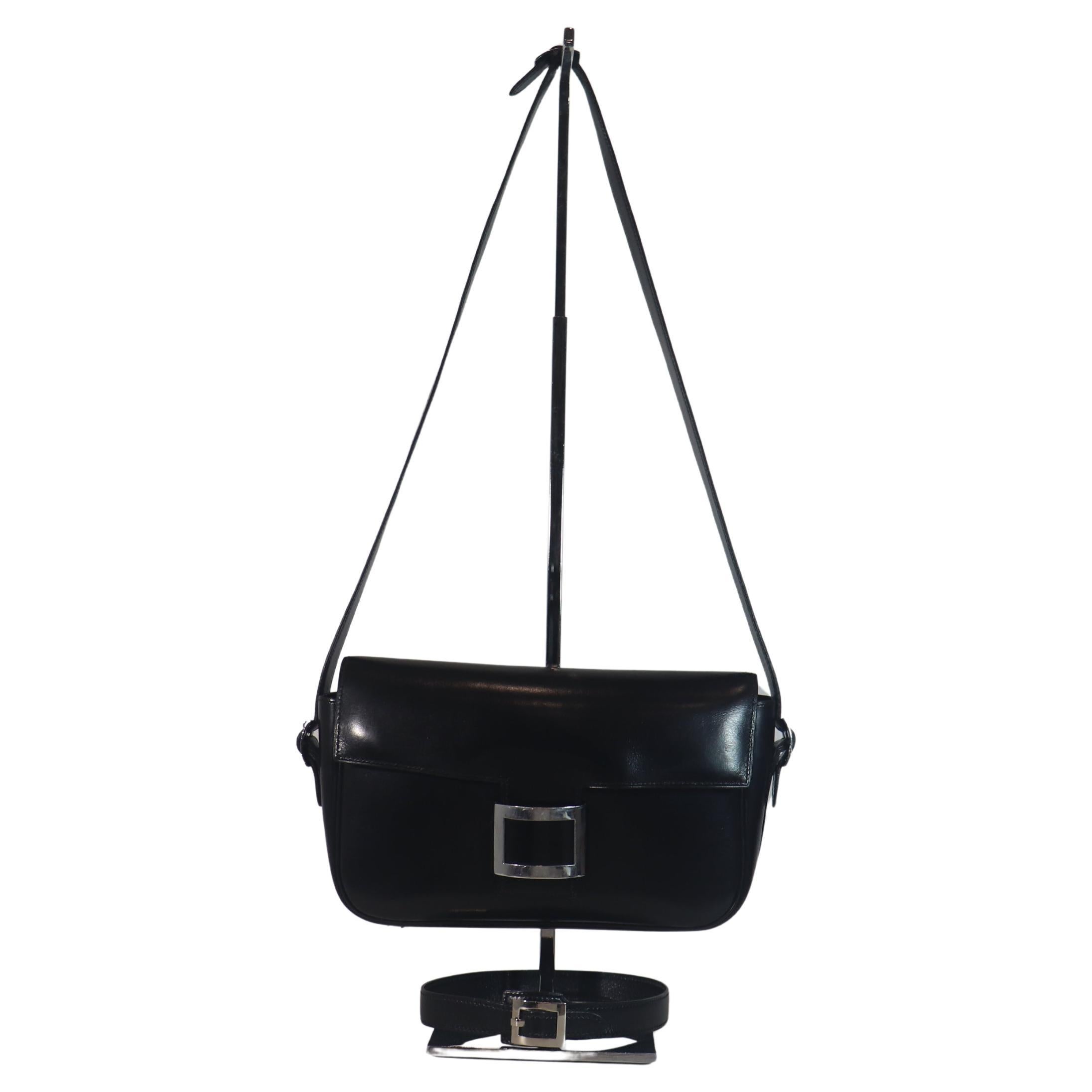 HERMÈS Black Leather Crossbody Bag with Silver Buckle and Adjustable Strap