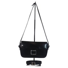 Vintage HERMÈS Black Leather Crossbody Bag with Silver Buckle and Adjustable Strap