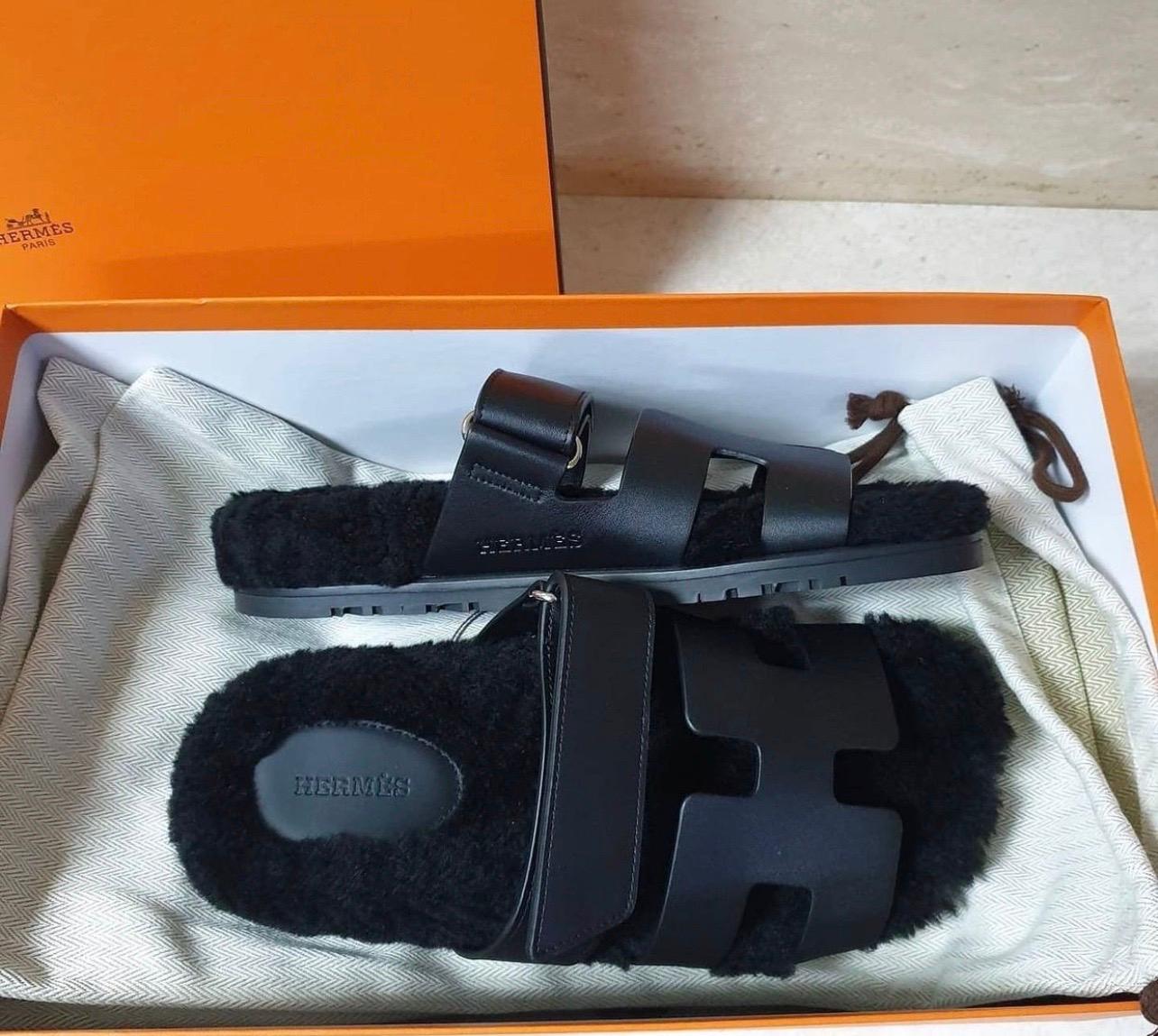 Hermès Chypre sandals in smooth black leather and woolskin - sold out worldwide. 
New, never worn.
Comes with dustbags.
Sz.37
For buyers from EU we can provide shipping from Poland. Please demand if you need.