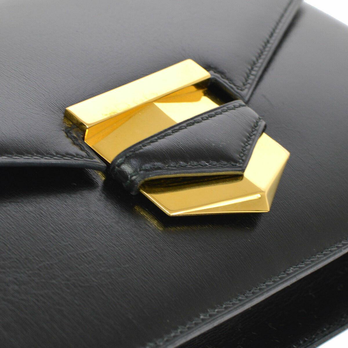 
Leather
Gold tone hardware
Leather lining
Made in France
Measures 10