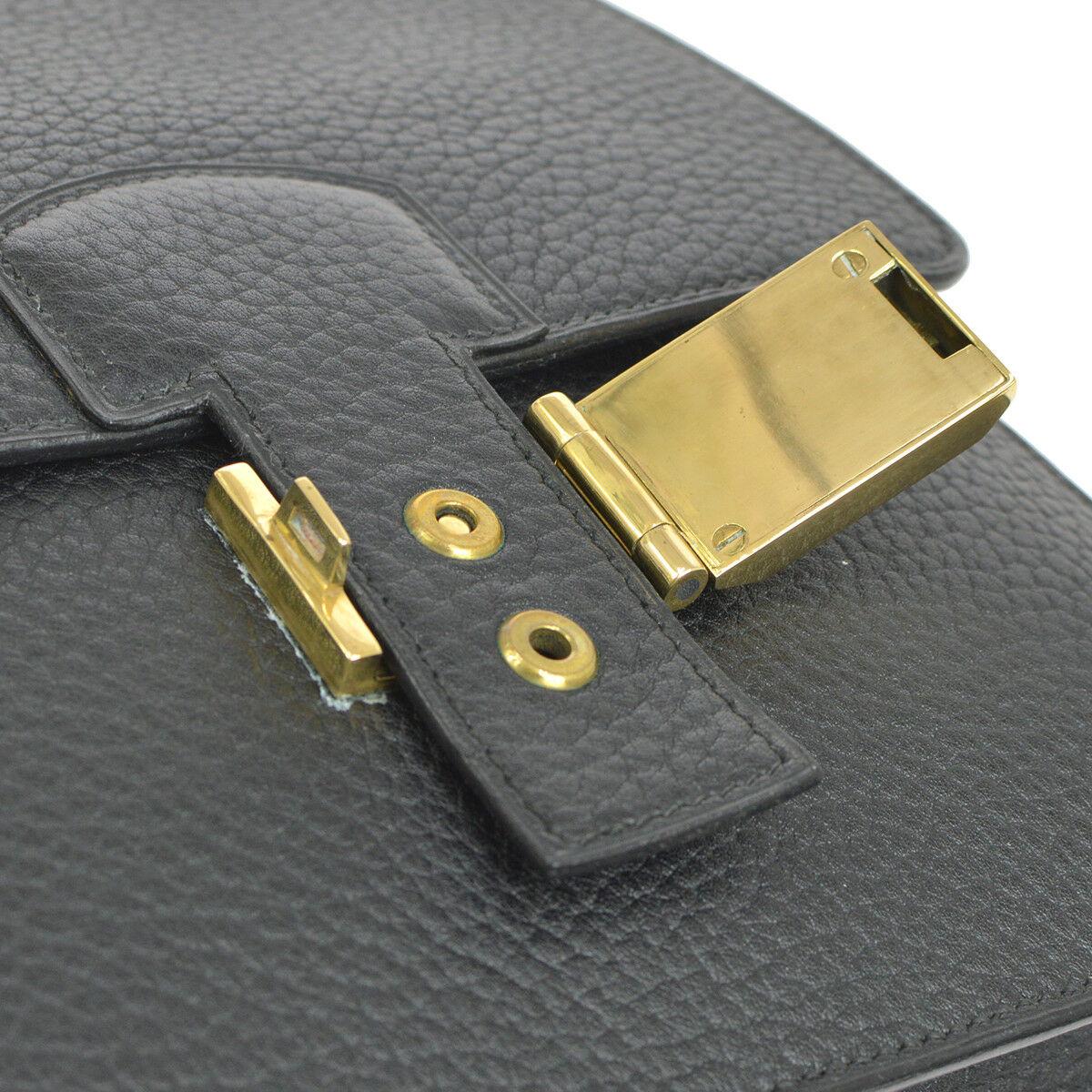 Hermes Black Leather Gold Flip Lock Buckle Evening Top Handle Shoulder Flap Bag

Leather
Gold tone hardware
Fliplock closure
Made in France
Date code present
Adjustable shoulder strap 8.5-15.5