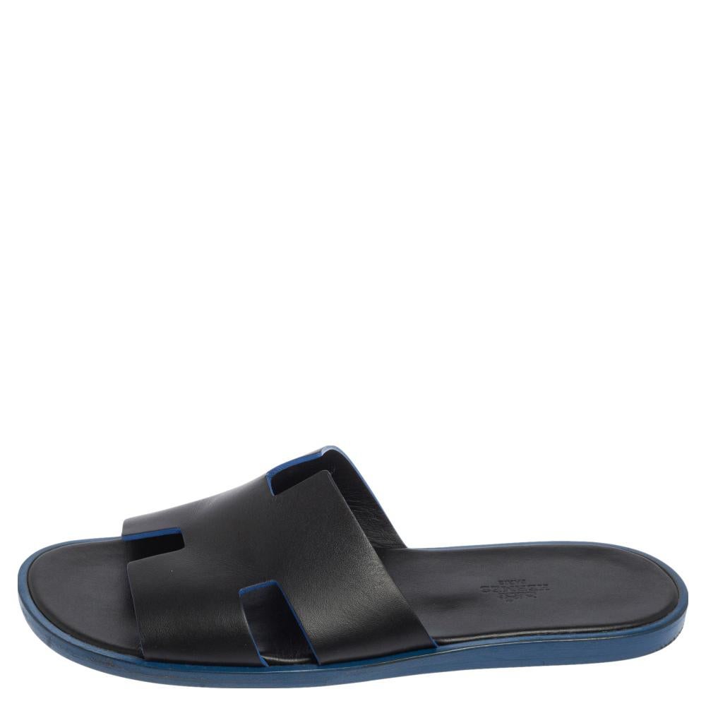 Hermès is a brand that epitomizes art and all their designs have a luxurious blend of comfort and style. These black Izmir sandals have been crafted from leather in Italy and feature the iconic H on the vamp, making it easy to slip on over all your