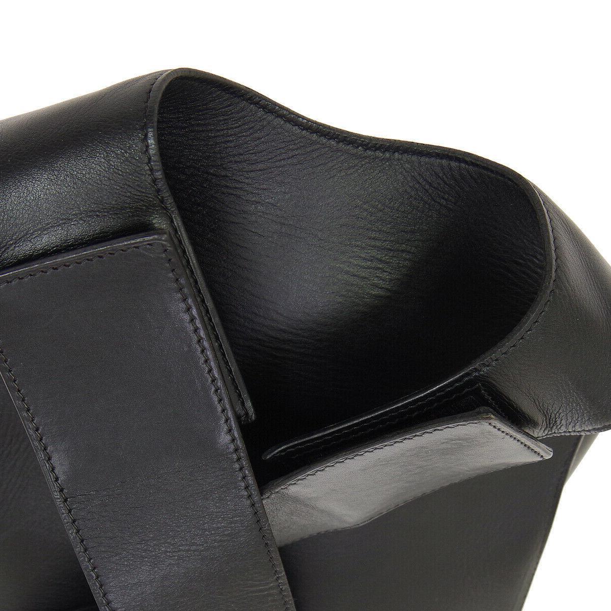 Hermes Black Leather Men's Women's Carryall Travel Shoulder Backpack Bag

Leather
Velcro closure
Made in France
Adjustable shoulder strap 17