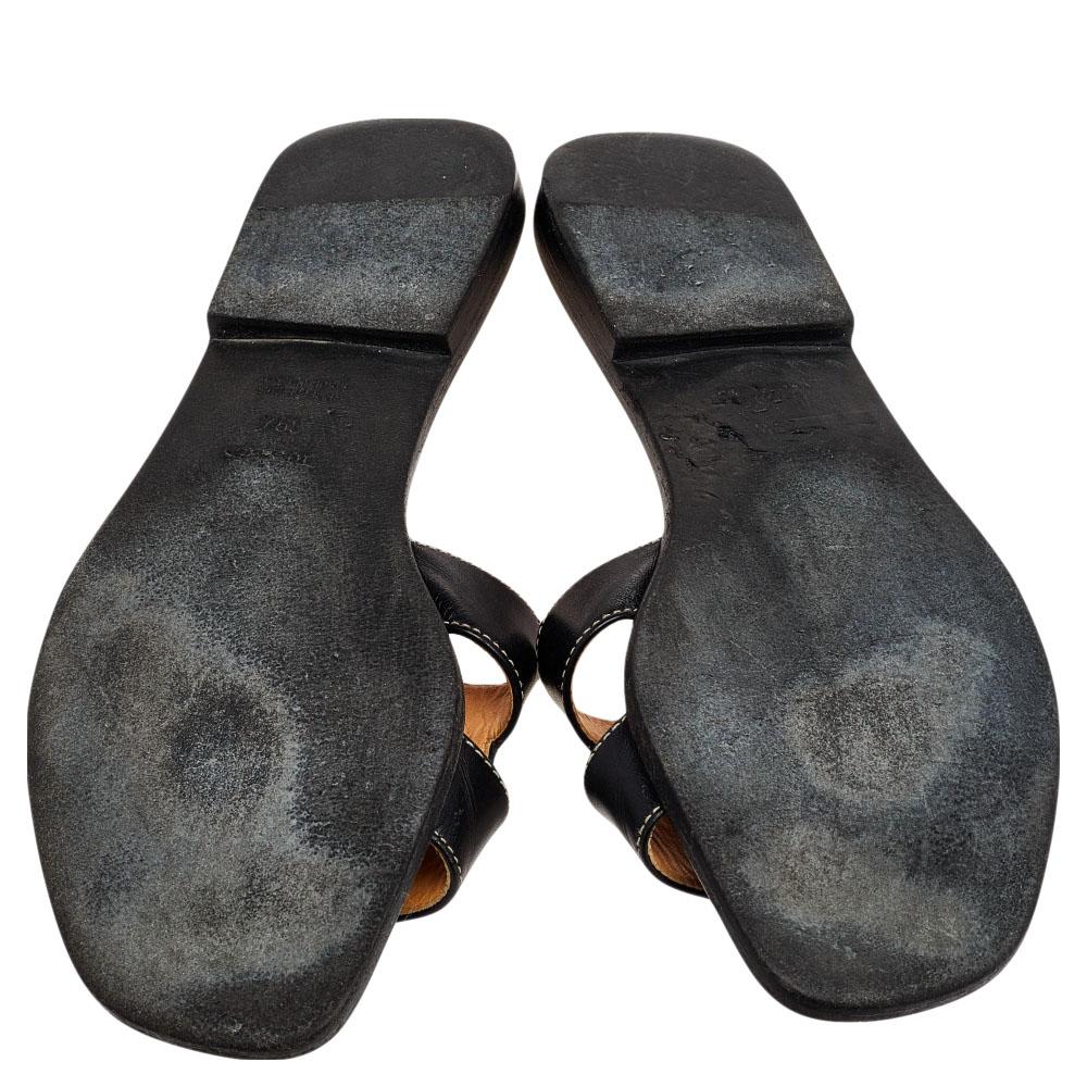 Put your best foot forward this season in these pretty Hermes sandals. These black Oran sandals have been crafted from leather in Italy and they feature the iconic H on the vamps as well as insoles meant to provide comfort at every step. These