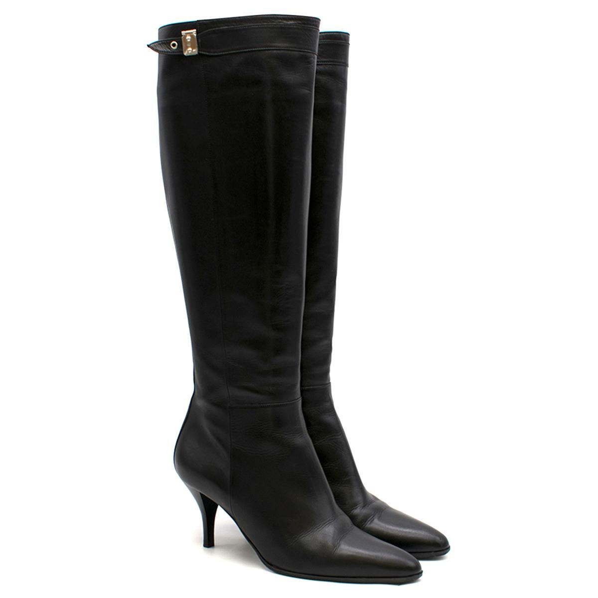 Hermes Black Leather Point-toe Heeled Long Boots

- Black long boots
- Low stiletto heels
- Leather sole and lining
- Silver padlock-effect plaque on decorative seamed strap
- Point-toe
- Concealed zip closure at the side

Please note, these items