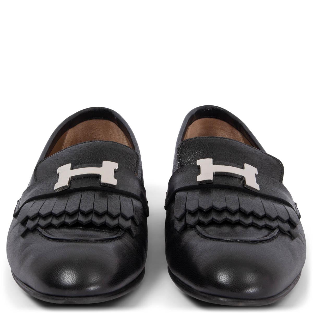 100% authentic Hermès Royal loafers in black smooth goat skin embellished with fringes and signature Palladium Constance-H buckle. Have been worn and are in excellent condition. 

Measurements
Imprinted Size	38.5
Shoe Size	38.5
Inside Sole	25.5cm