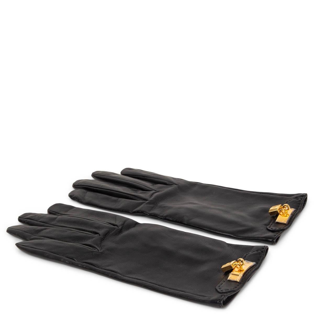 100% authentic Hermès Soya Lock gloves in black smooth lambskin featuring gold-tone metal lock. Silk-lined. Brand new. 

Measurements
Size	8.5
Tag Size	8.5
Middle Finger to Wrist	25cm (9.8in)
Middle Finger	10cm (3.9in)
Width	10cm