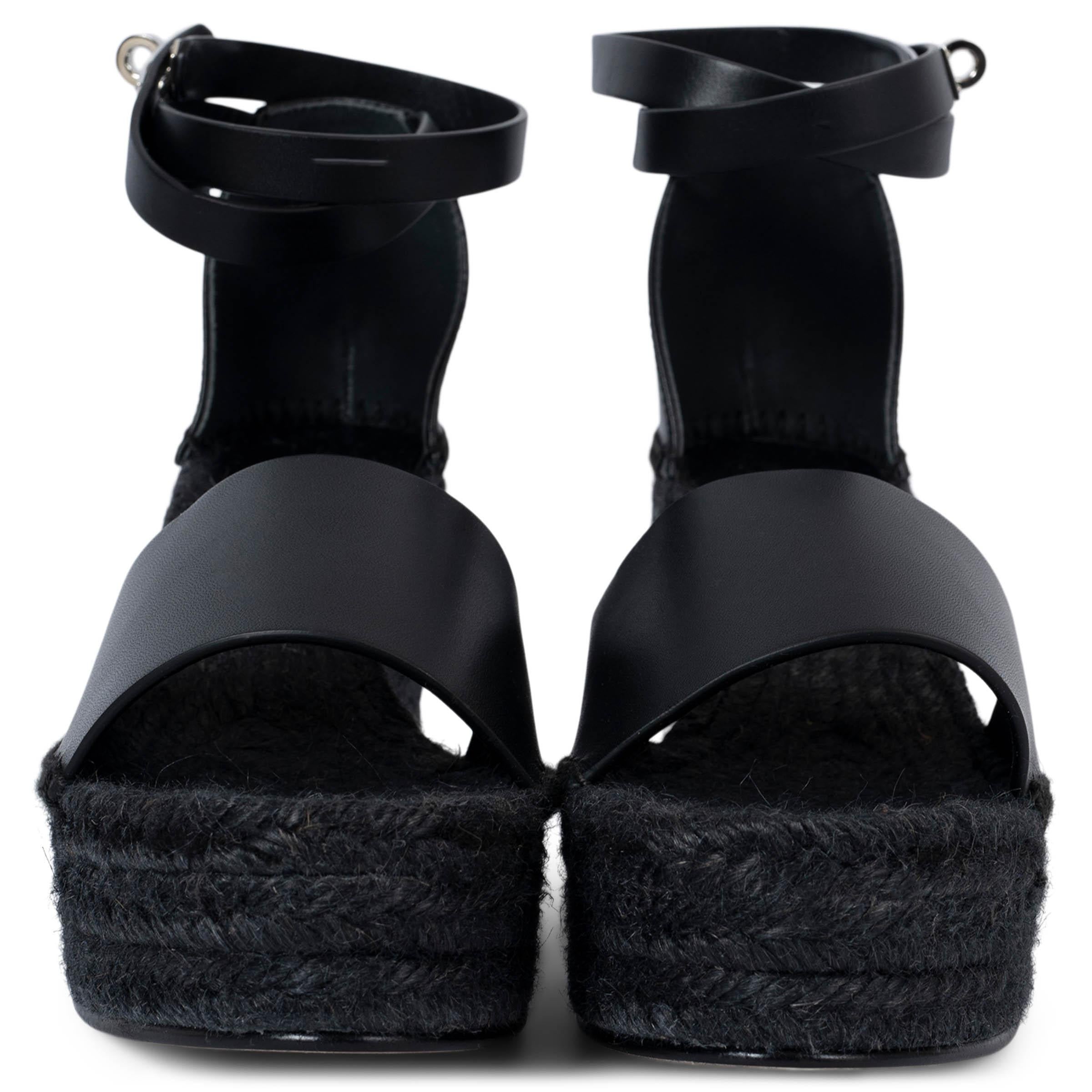 100% authentic Hermès Tipoli espadrille wedge sandals in smooth Noir goatskin with iconic Palladium plated buckle, wrap-around ankle strap and natural rope heel. Brand new. 

Measurements
Model	H191098Z 01340
Imprinted Size	41 (run small)
Shoe