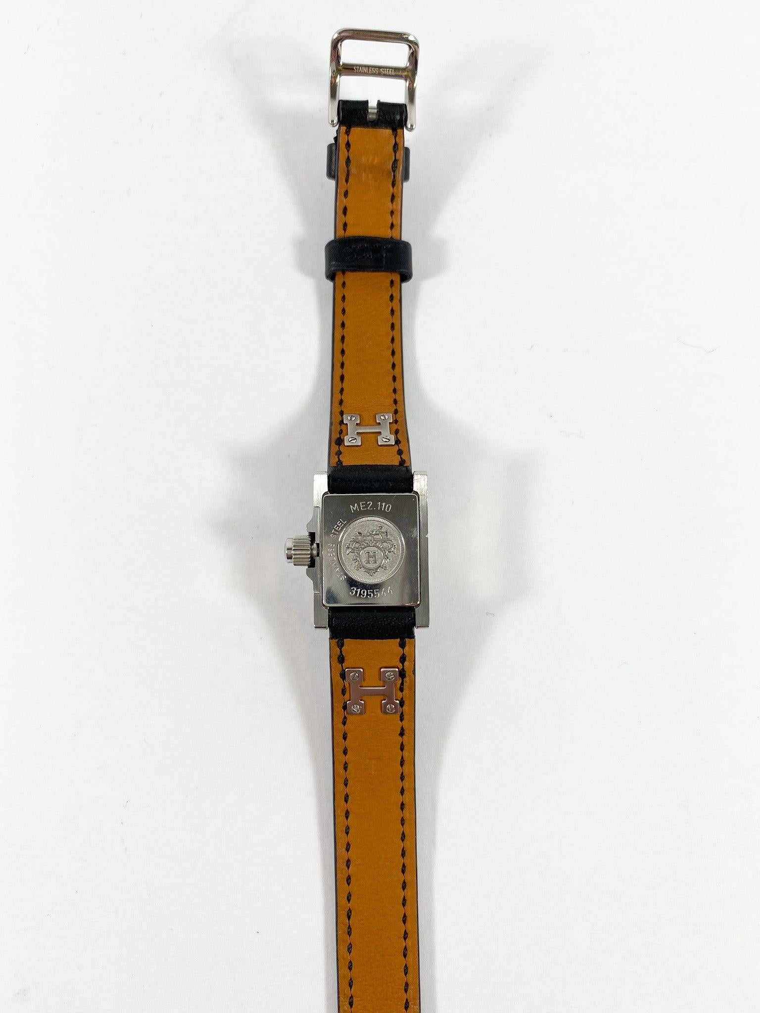 Hermès Black Medor Watch with Extra Band

This is an authentic Hermes Medor wrist watch. The watch comes with a black leather band and an alternate brown leather band that can be changed. This watch features the classic Hermes studs. The larger