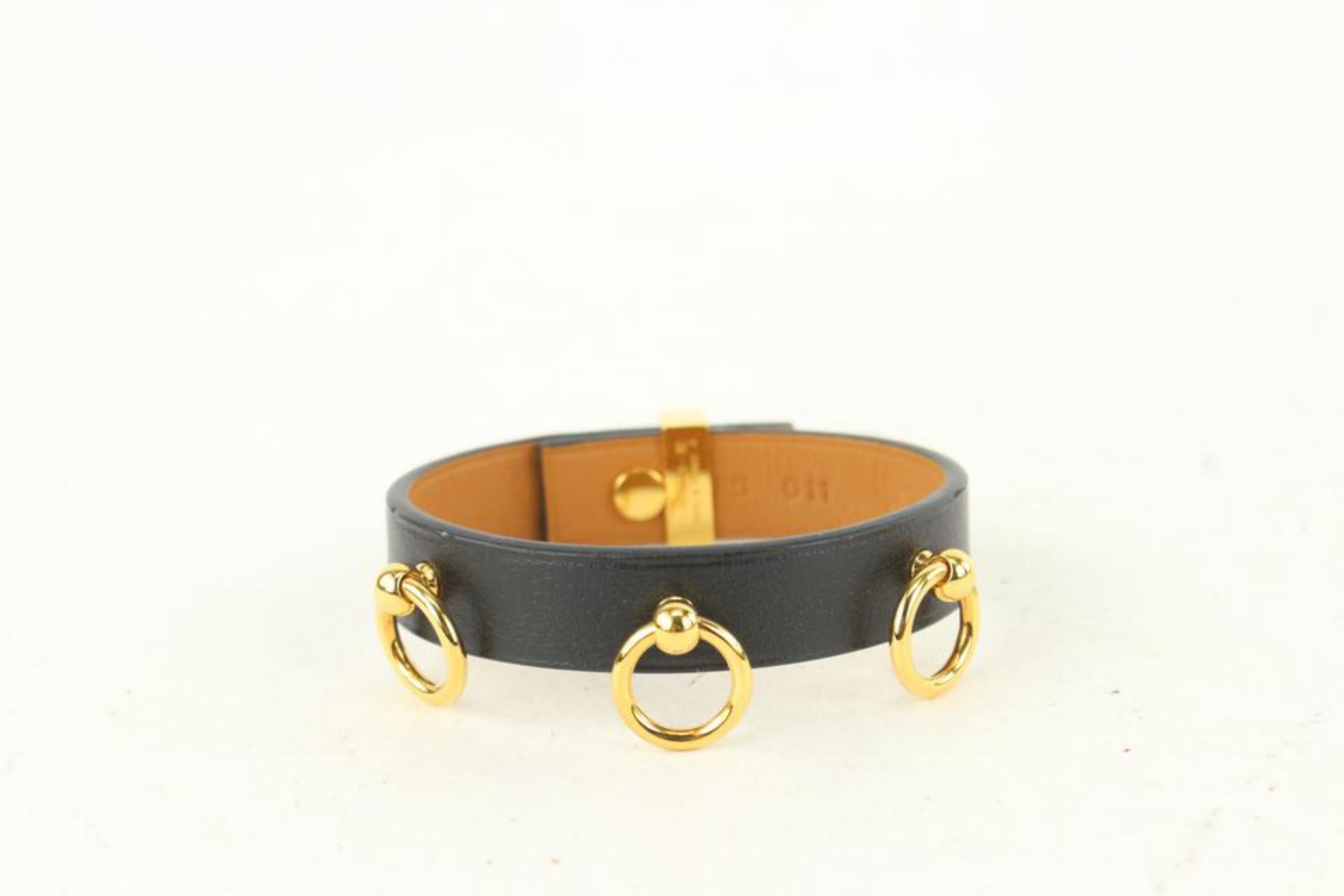 Hermès Noir Mini Chien Anneaux Bracelet Manchette Kelly Bangle 0H14 Bon état - En vente à Dix hills, NY