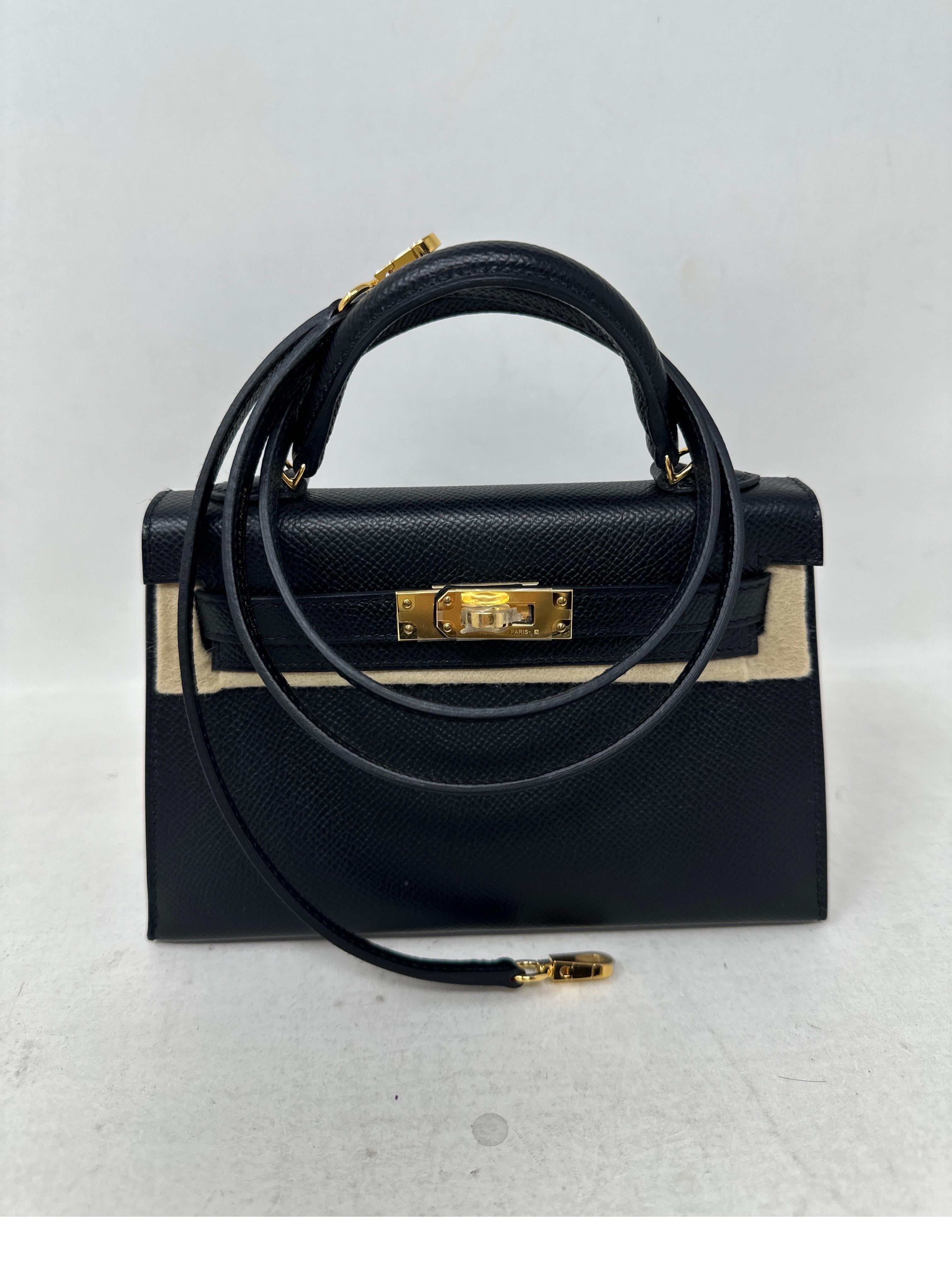 cartera hermes negra
