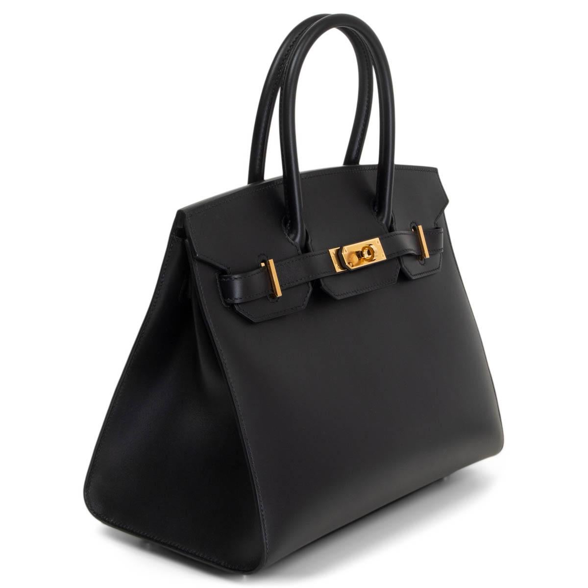 100% authentic Hermes 'Birkin 30 Sellier' bag in Noir (black) Veau Monsieur leather with gold-plated hardware. Lined in Chevre (goat skin) with an open pocket against the front and a zipper pocket against the back. Brand new. Comes with keys, lock,
