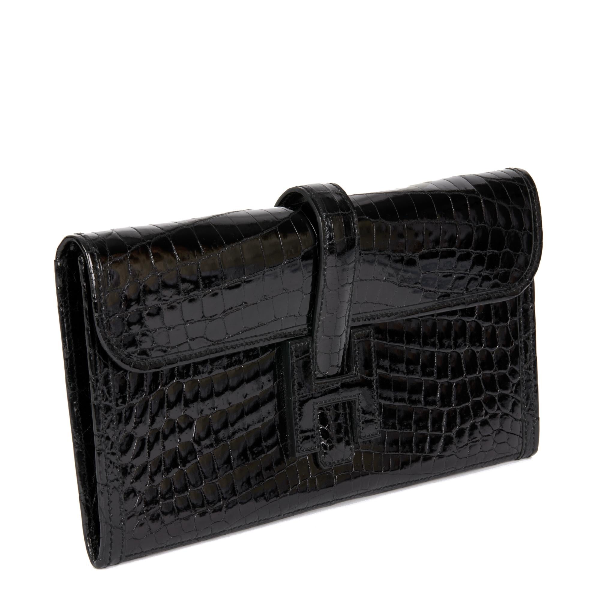 HERMÈS
Black Niloticus Crocodile Leather Jige Elan 29

Serial Number: X
Age (Circa): 2016
Accompanied By: Hermès Dust Bag
Authenticity Details: Date Stamp (Made in France)
Gender: Ladies
Type: Clutch

Colour: Black
Material(s): Niloticus