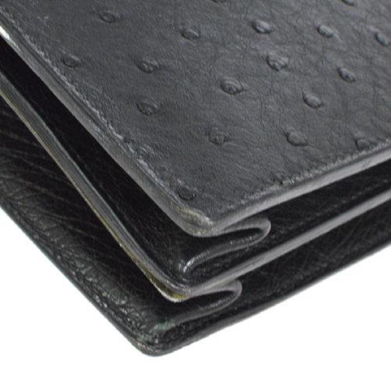 HERMES Bolsa Maletín de viaje para hombre en piel exótica de avestruz negra Sac A Depeches en venta 2