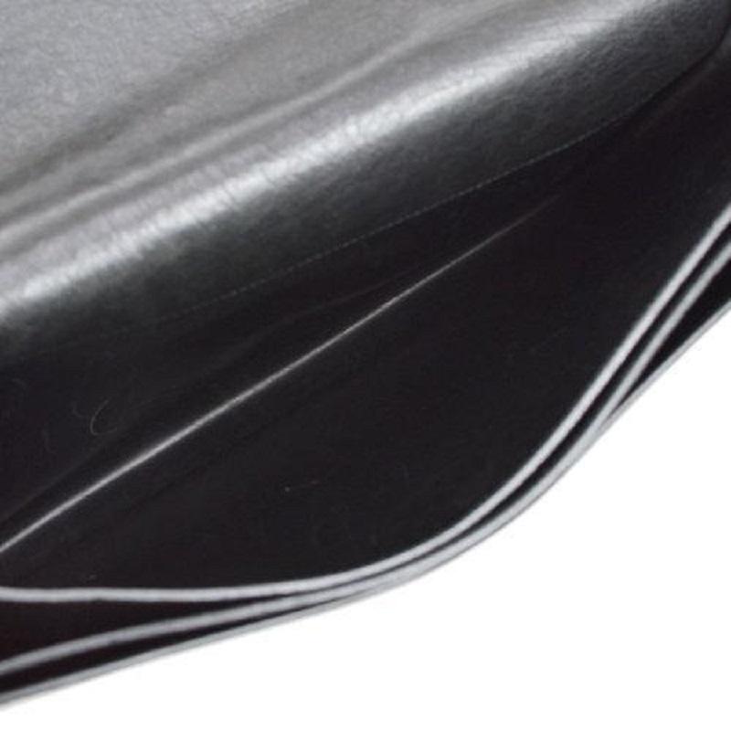 HERMES Bolsa Maletín de viaje para hombre en piel exótica de avestruz negra Sac A Depeches en venta 4