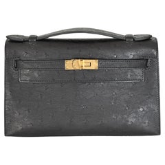 Hermès Kelly Pochette Terracotta Terre Cuite Ostrich with Palladium  Hardware - Bags - Kabinet Privé