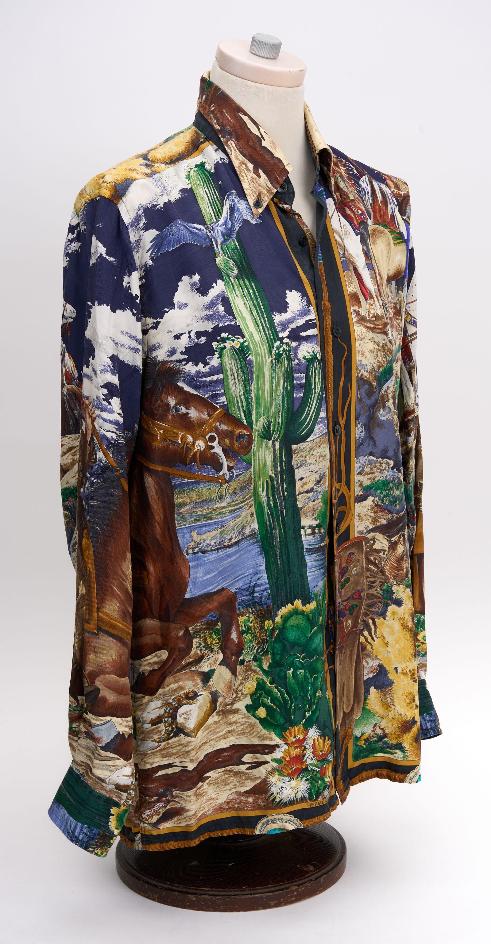 This beautiful Hermès 100% silk button down is a classic piece to compliment any wardrobe. Features Native American Indian print by world renowned Texas native Kermit Oliver. French Size 38, us size 6/8
Please refer to measurements below.
Shoulder 