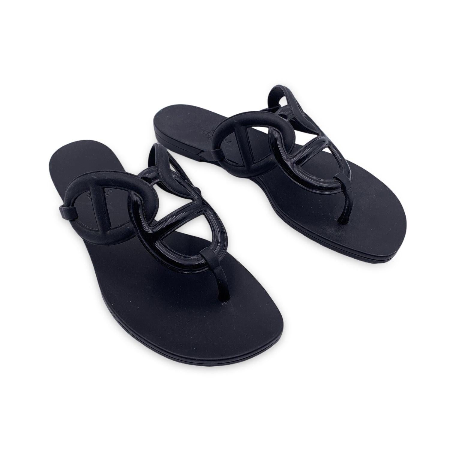 Hermès 'Egerie' sandal in waterproof rubber with Chaine d'Ancre motif. Size 36. Foot lenght: 9 inches - 23 cm Details MATERIAL: Leather COLOR: Black MODEL: Egerie GENDER: Women COUNTRY OF MANUFACTURE: Italy STYLE: Flip Flop PATTERN: Solid SEASON: