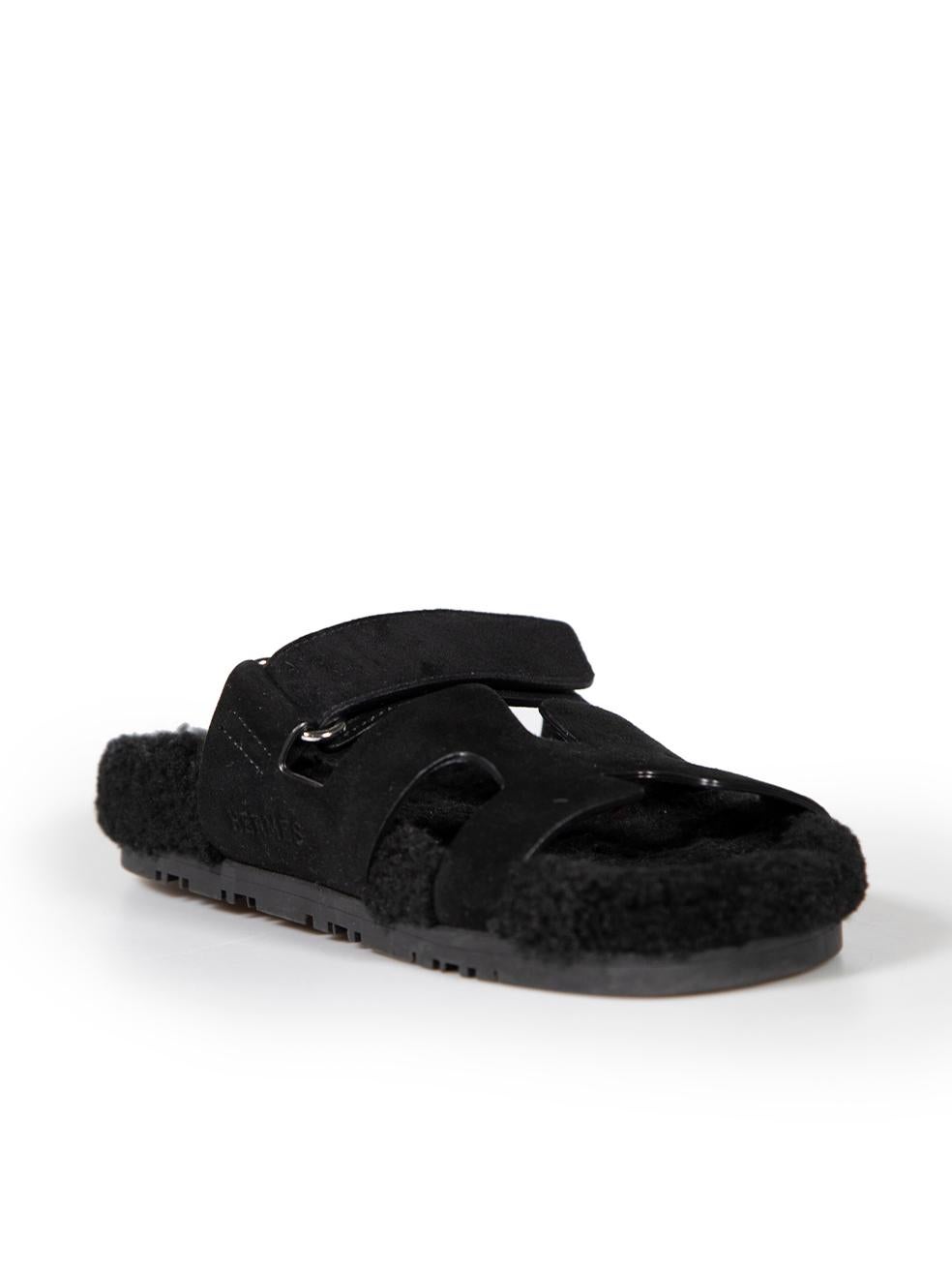 CONDITION is Good. General wear to sandals is evident. Moderate signs of wear to the shearling footbed with some noticeable spots of compression and abrasion seen throughout. Mild scuffing is also found through the outsole on this used Hermès