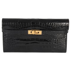Used Hermès Black Shiny Alligator Kelly Longue Wallet GHW
