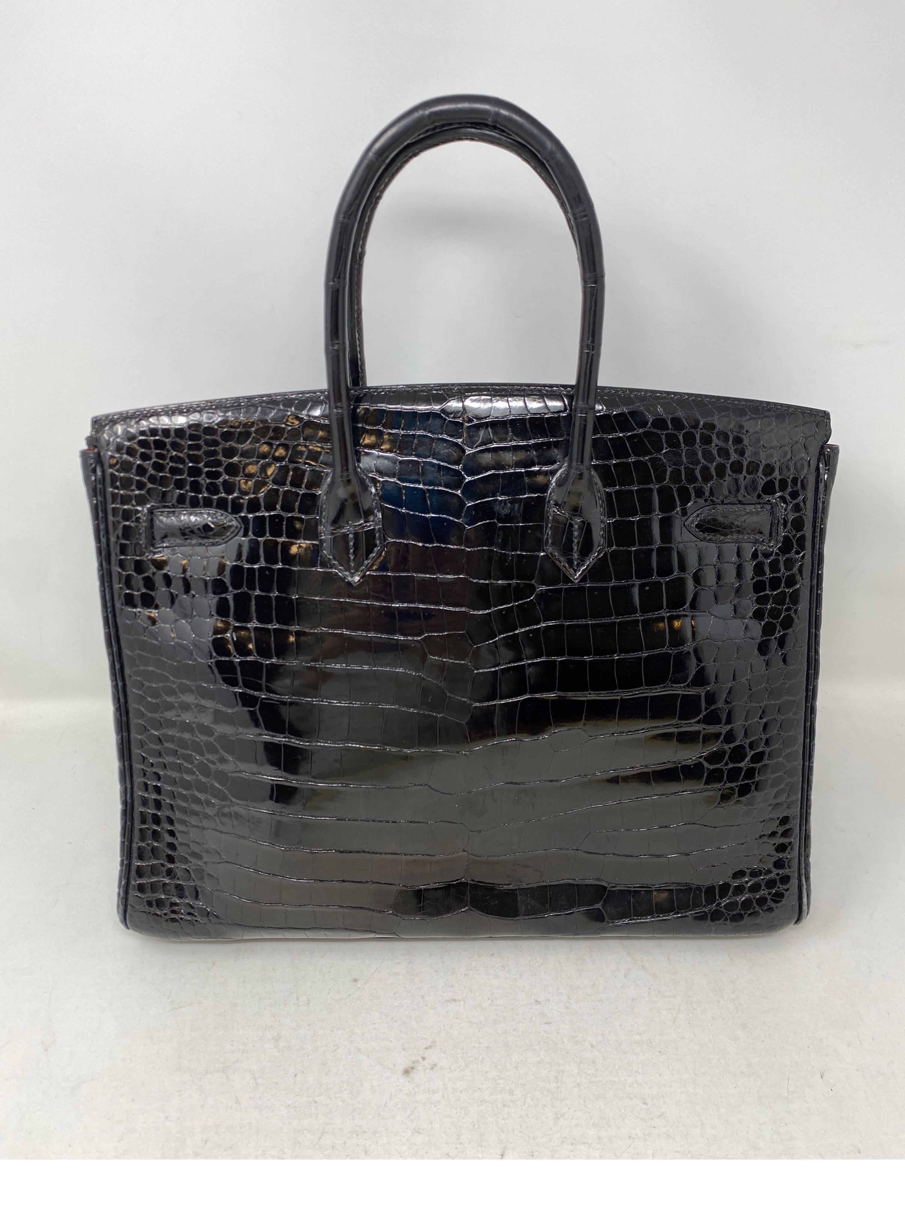 Hermes Black Shiny Porosus Crocodile Birkin 35 Bag In Good Condition In Athens, GA