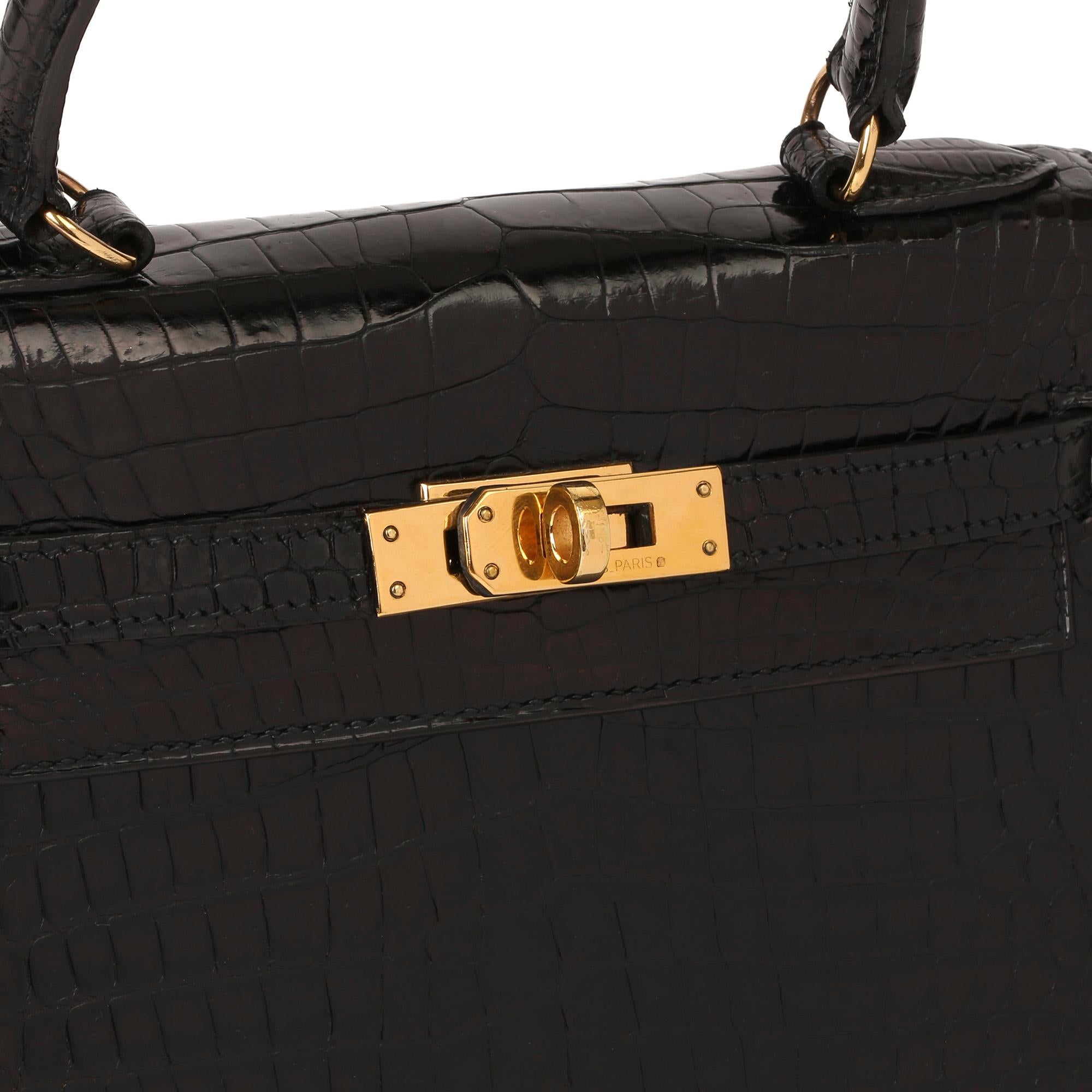 HERMÈS
Black Shiny Porosus Crocodile Leather Vintage Kelly 20cm Sellier

Xupes Reference: HBJJLG022
Serial Number: (W)
Age (Circa): 1993
Accompanied By: Hermès Dust Bag, Shoulder Strap
Authenticity Details: Date Stamp (Made in France)
Gender: