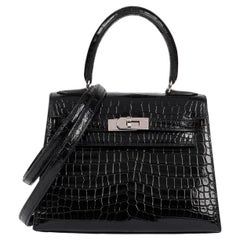 Hermès Pelle nera lucida di coccodrillo Porosus Kelly vintage 20cm Sellier