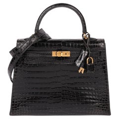 Hermès Pelle nera lucida di coccodrillo Porosus Kelly vintage 25cm Sellier