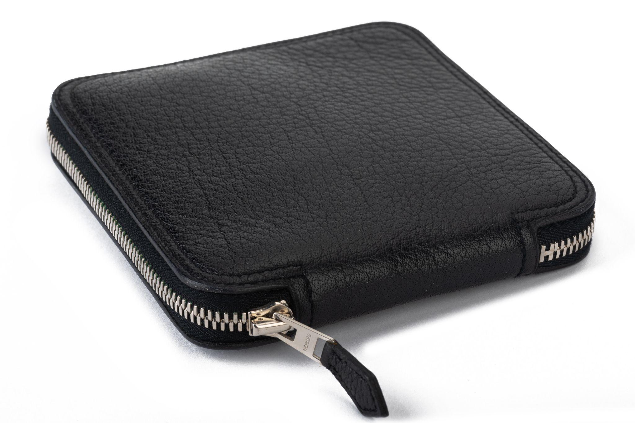 Hermès excellent condition black silky pop bag. Bag closed 5”x5”x1”. Comes with original dust cover.