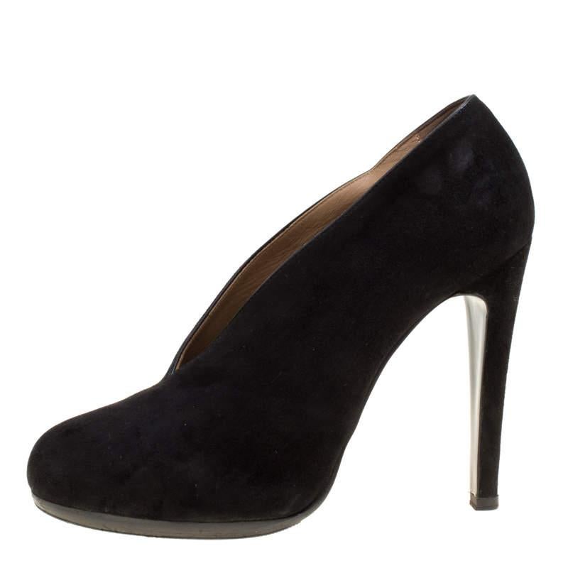 These classy pumps from Hermes are worth splurging on. Crafted from suede they carry a black shade with round toes comfortable insoles and 11.5 cm heels. Walk in them and you are sure to have a blissful day.
