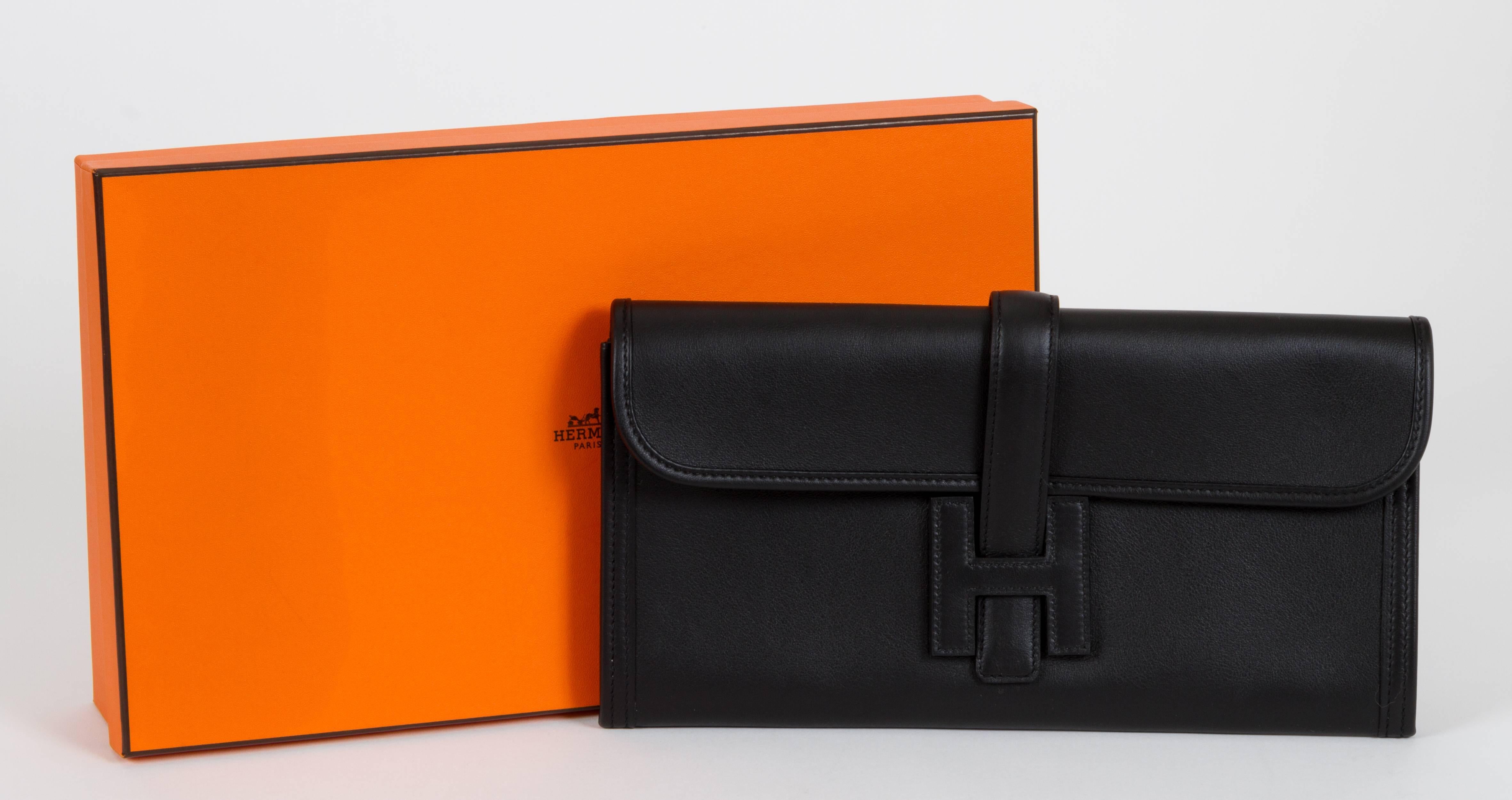 Hermès Jige clutch in black swift leather brand new in box. Letter Y for 2020. Comes with original dust bag and box .