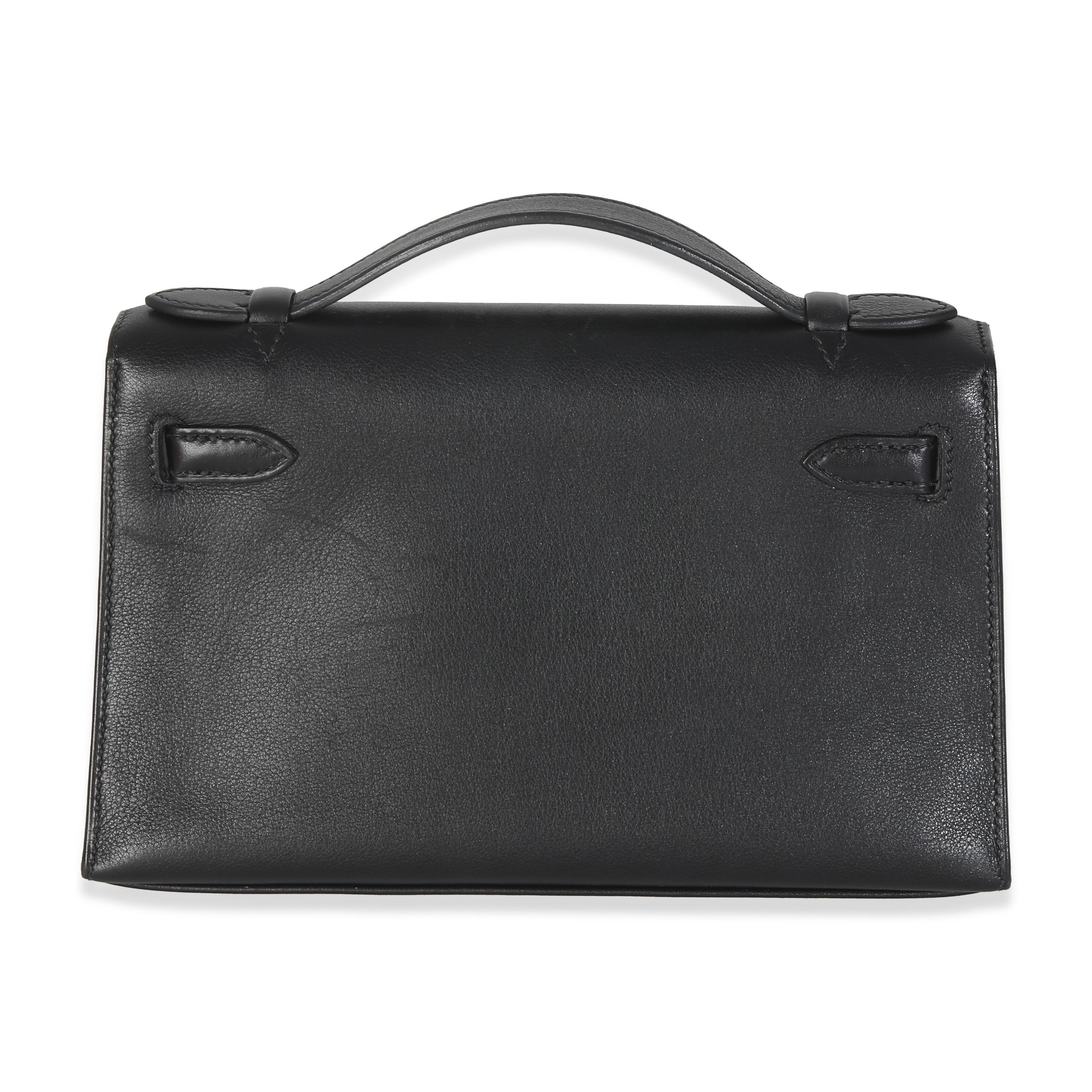 Listing Title: Hermes Black Swift Kelly Pochette
SKU: Z146273
Condition: Pre-owned 
Condition Description: Officially renamed in 1977, the Kelly tote bag from Hermès was originally called the Sac à Dépêches (which translates as ‘the dispatch bag’).