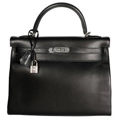 Hermès Black Swift Leather Retourne Kelly 28 with Palladium Hardware