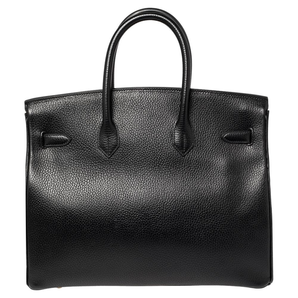 If you've been wishing to own an authentic Birkin, there is no better time to buy this coveted work of art than now. Here, we have this black Birkin 35 just for you. Crafted in France from Taurillon Clemence leather, the bag features dual top