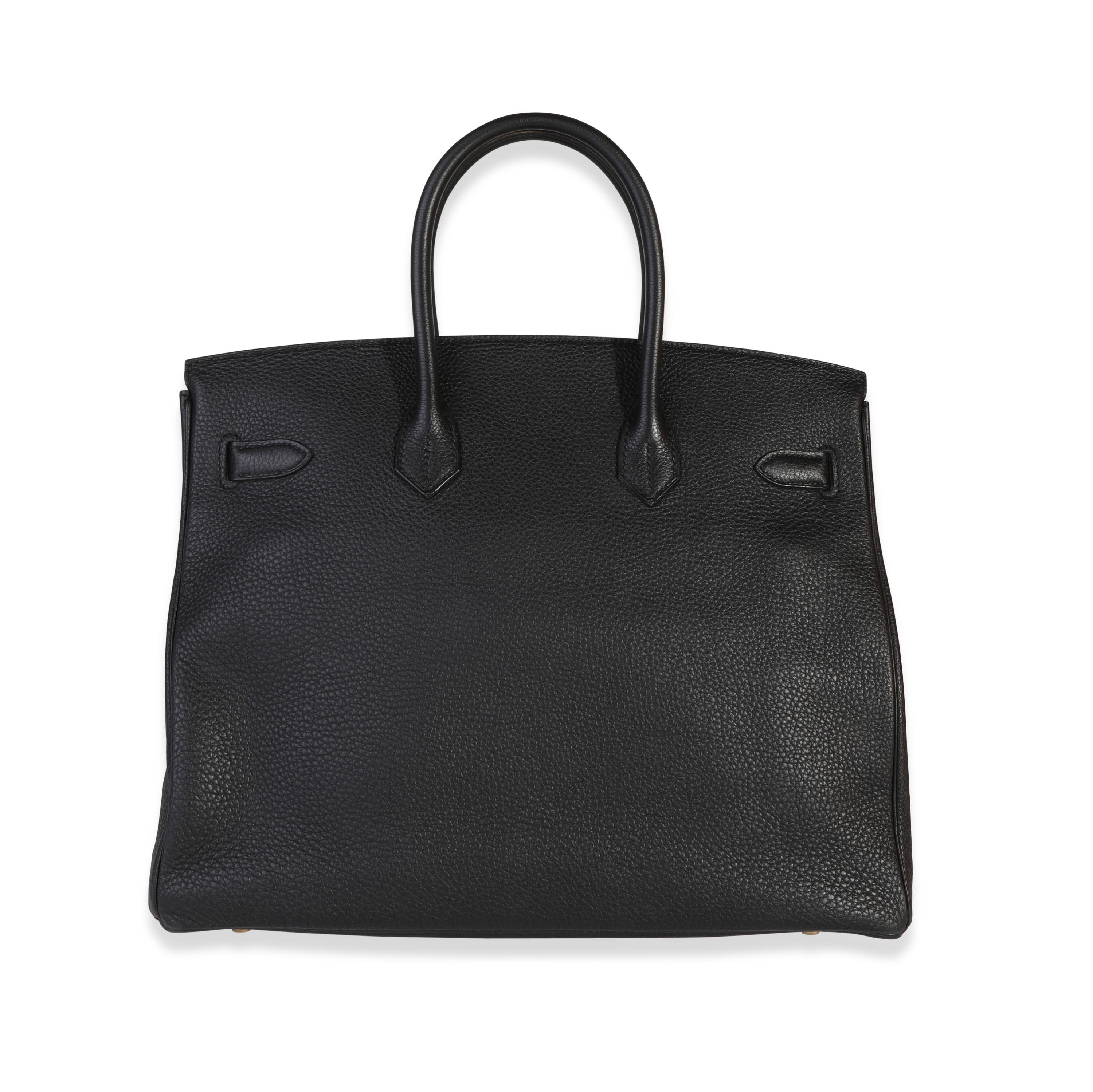 Listing Title: Hermès Black Togo Birkin 35 GHW
SKU: 118792
Condition: Pre-owned 
Handbag Condition: Very Good
Condition Comments: Very Good Condition. Light scuffing to corners. Scuffing and faint splitting to handles. Light marks to exterior.