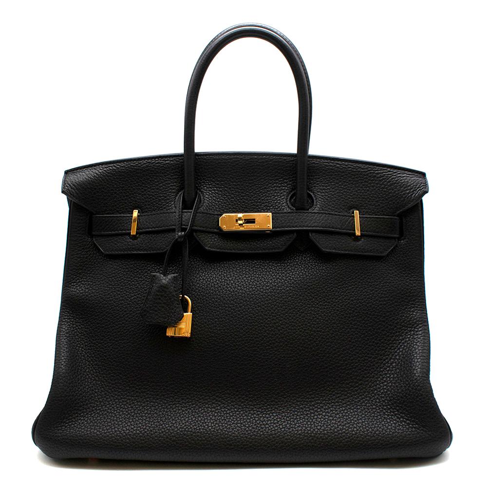 Hermes Black Togo Leather Birkin 35 GHW

One of the most desirable and celebrated bag designs in the world the Hermes Birkin is absolutely iconic. 
This outstanding piece comes in a neutral black hue accentuated with gold plated hardware.

-Made of
