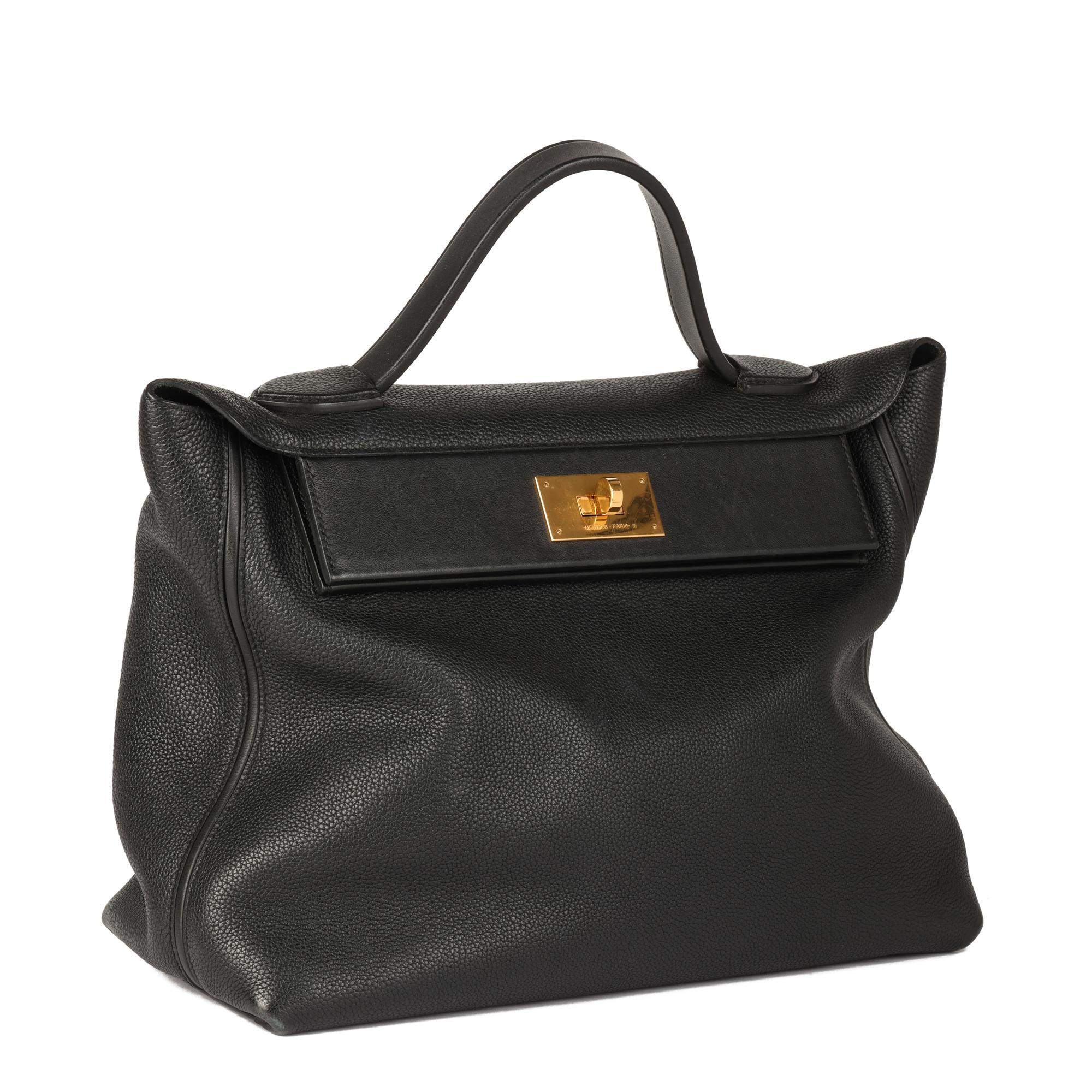 Hermès Black Togo Leather & Swift Leather 24/24 35cm

CONDITION NOTES
The exterior is in very good condition with light signs of use and scratches on the swift leather.
The interior is in excellent condition with light signs of use.
The hardware is