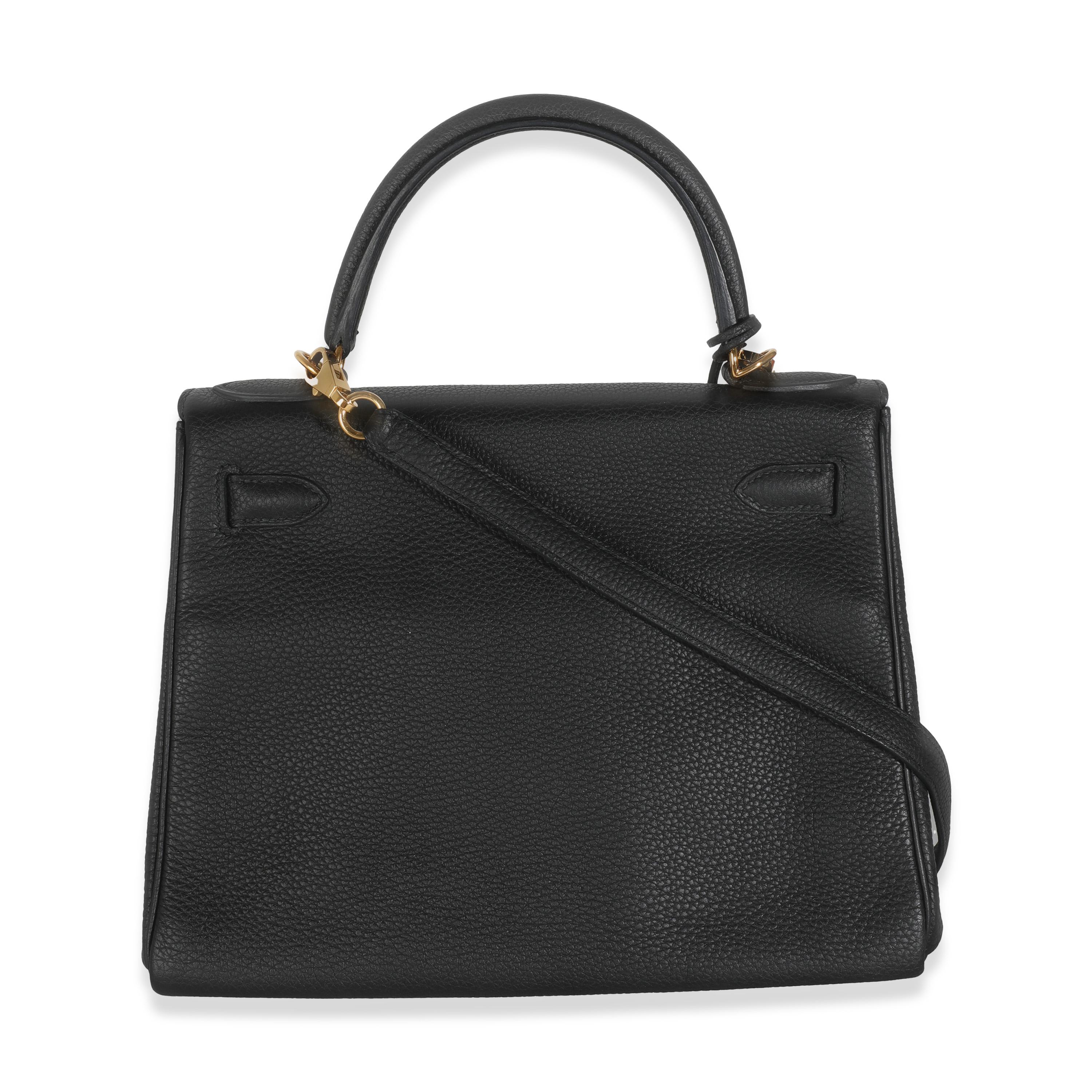 Listing Title: Hermès Black Togo Retourne Kelly 28 GHW
SKU: 138681
Condition: Pre-owned 
Condition Description: Officially renamed in 1977, the Kelly tote bag from Hermès was originally called the Sac à Dépêches (which translates as ‘the dispatch