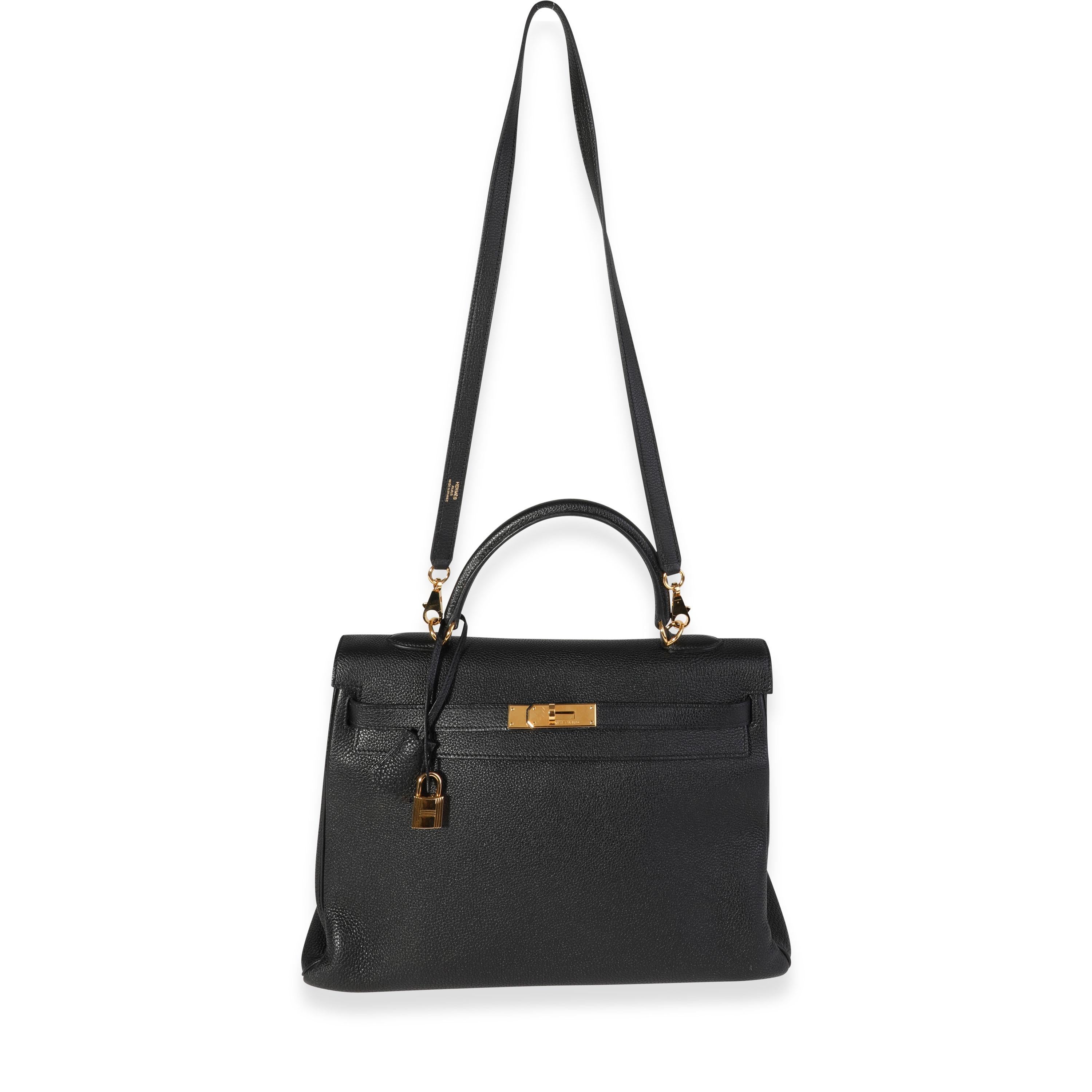 Listing Title: Hermès Black Togo Retourne Kelly 35 GHW
SKU: 120290
Condition: Pre-owned 
Handbag Condition: Very Good
Condition Comments: Very Good Condition. Plastic on some hardware. Light scuffing to corners and exterior. Scratching to hardware.