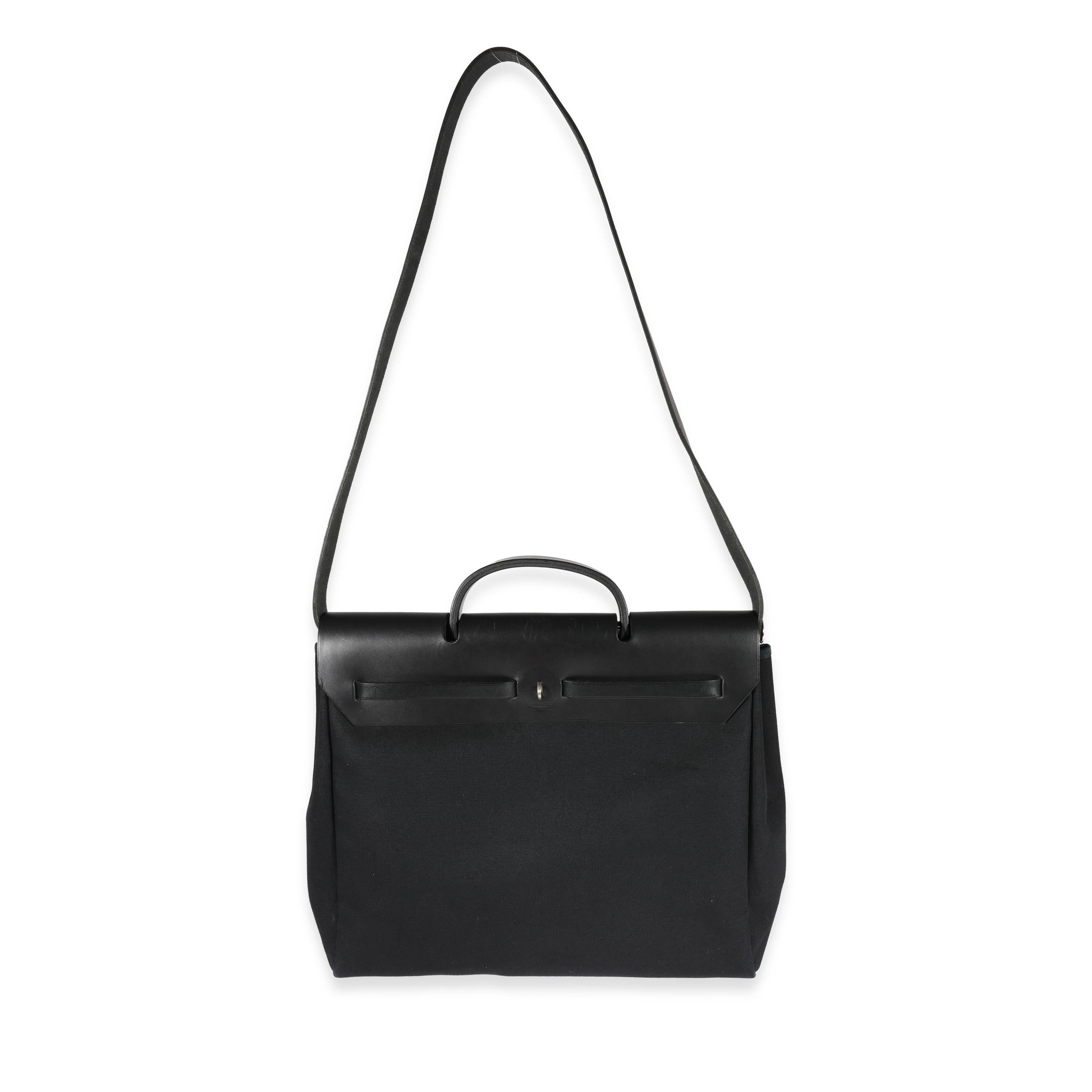 Listing Title: Hermès Black Toile & Vache Hunter 2-In-1 Herbag PHW
SKU: 116047
Condition: Pre-owned 
Handbag Condition: Good
Condition Comments: Good Condition. Discoloration and marks throughout exterior and insert. Scuffing and discoloration