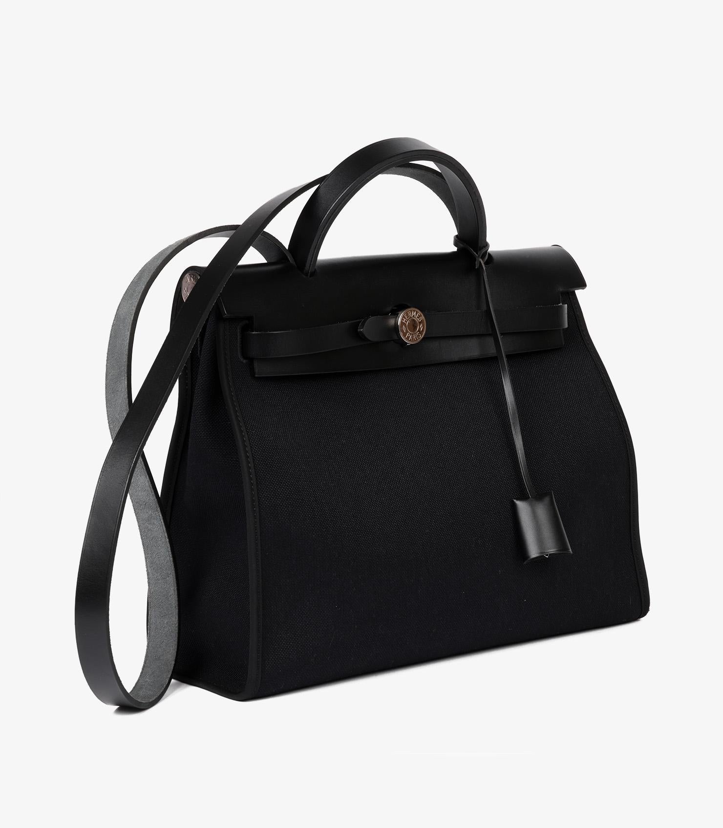 Hermès Black Vache Hunter Leather & Toile Herbag Zip 31

Product Details
Xupes Ref: HB5650
Brand: Hermès
Model: Herbag Zip 31
Type: Top Handle, Shoulder
Serial Number: C
Age: 2018
Accompanied By: Hermès Dust Bag, Box, Small Dust Bag, Padlock, Keys