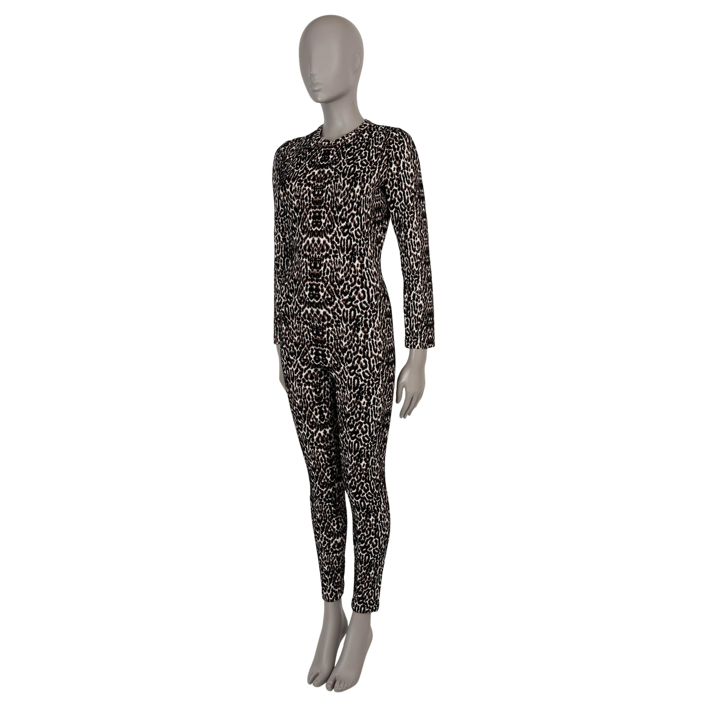 This 100% authentic Alaïa catsuit in black, cream, and brown lightweight leopard jacquard knit viscose (73%), polyamide (20%), polyester (5%), and elastane (2%)—please note the content tag is missing—reinterprets an iconic look from the AW 1991