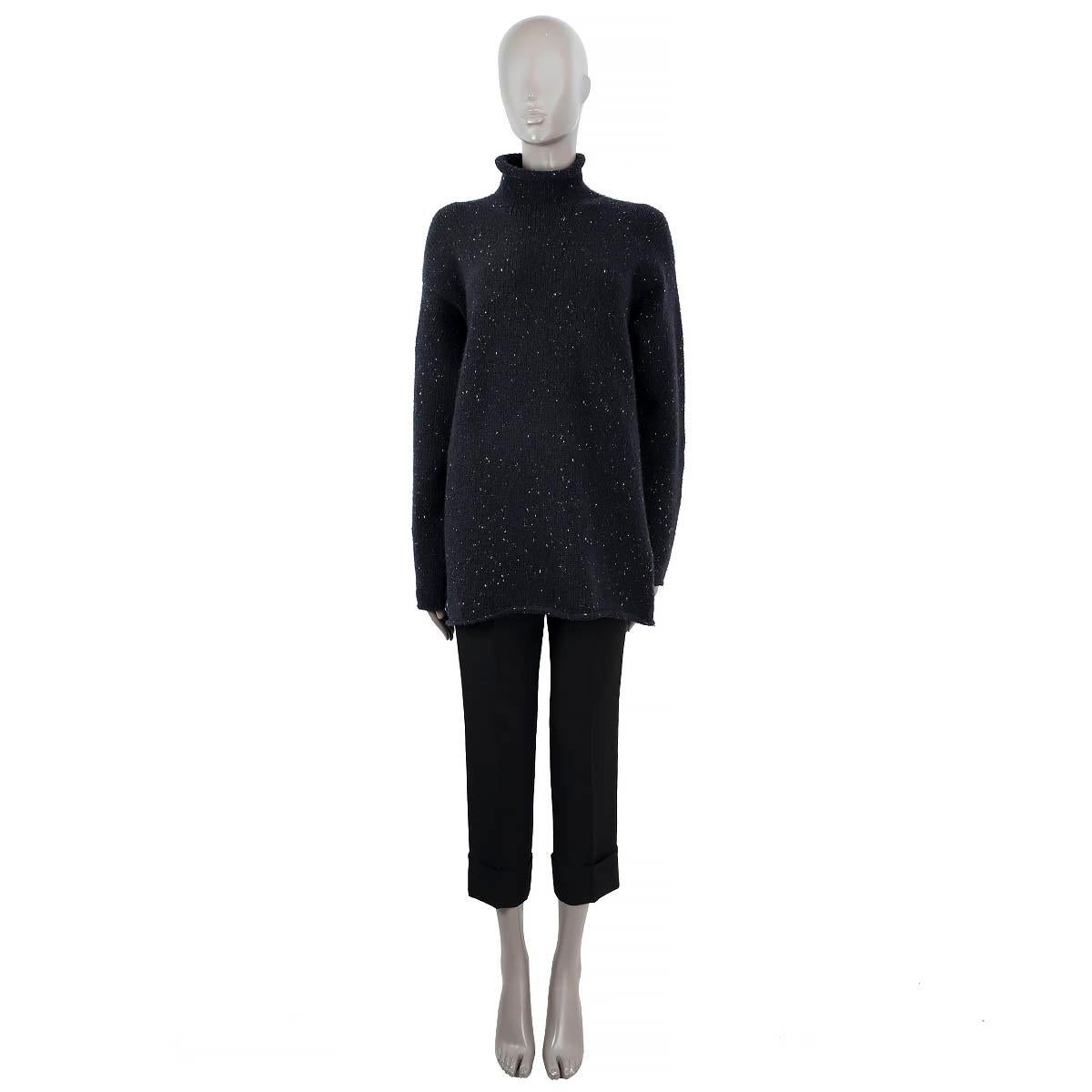 100% authentic Hermès speckled sweater in black and white cashmere (96%) and polyester (4%). Featured are turtelneck and knitted rolled edges. Medium weight. Has been worn and is in excellent condition.

Measurements
Tag Size	XL
Size	XL
Shoulder