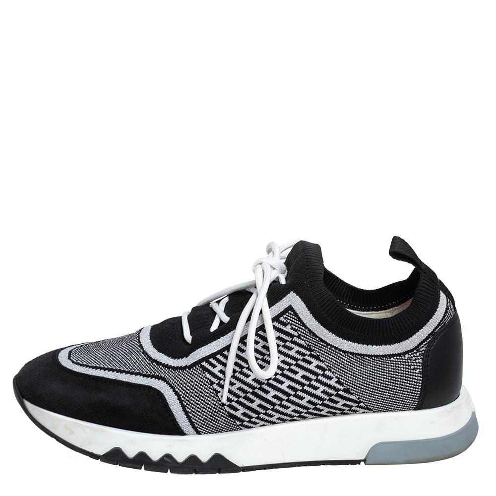 The Addict sneakers by Hermes present a classic style in a modern tone. These are crafted in knit fabric and suede to achieve an optical illusion effect. The sneakers are secured with lace-ups and equipped with rubber soles offering a good grip.

