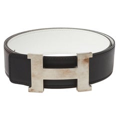 Hermés Ceinture réversible Constance en cuir Swift et Epsom noir/blanc 85CM