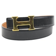 Hermès - Ceinture noire x marron 18 mm H avec logo et chaîne dorée 121h61