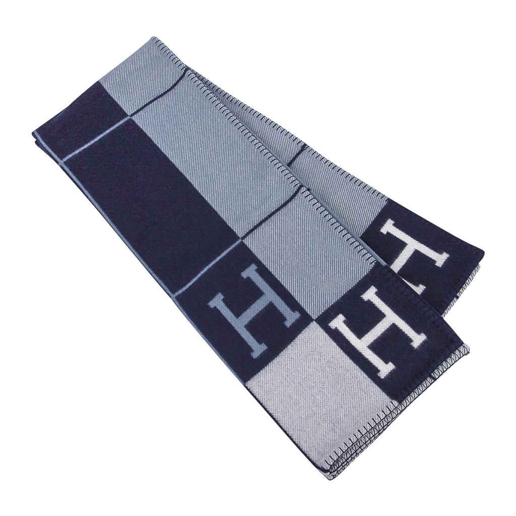 Mightychic offers a guaranteed authentic Hermes classic Avalon III signature H blanket featured in Caban and Ecru.
Created from 90% Merino Wool and 10% cashmere and has whip stitch edges.
New or Pristine Store Fresh Condition. 
Please see the