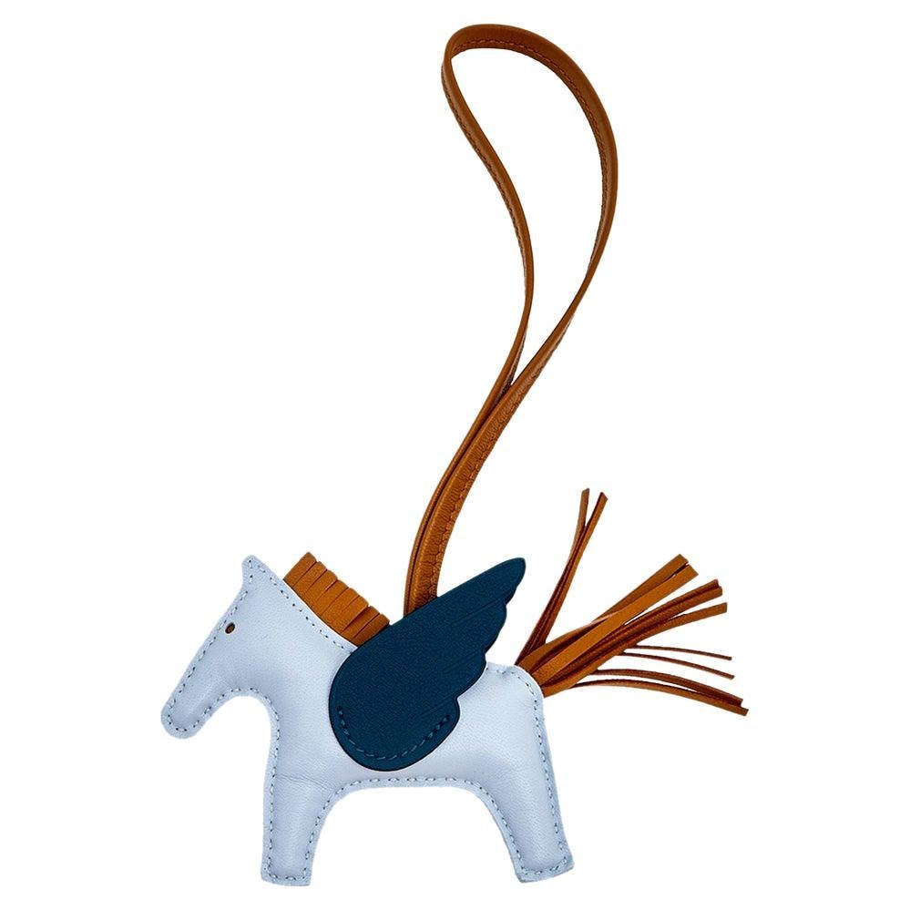 Rodeo bag charms by Hermès come close to being as rare as some of the brand's bags. Collected by fans of Hermès and bags alike, these little galloping charms are dream pieces to dress up one's precious possessions. Hermes pays homage to its