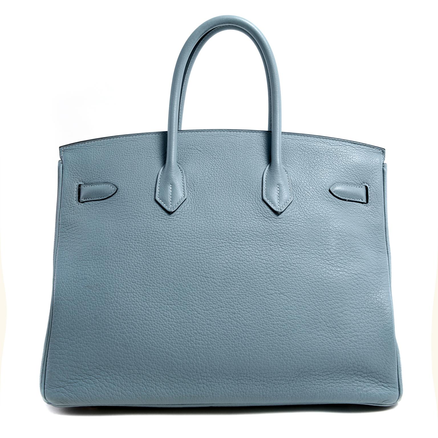 This authentic Hermès Bleu Ciel Clemence 35 cm Birkin is in excellent condition. Hermès bags are considered the ultimate luxury item the world over.  Hand stitched by skilled craftsmen, wait lists of a year or more are common.  Bleu Ciel is a soft
