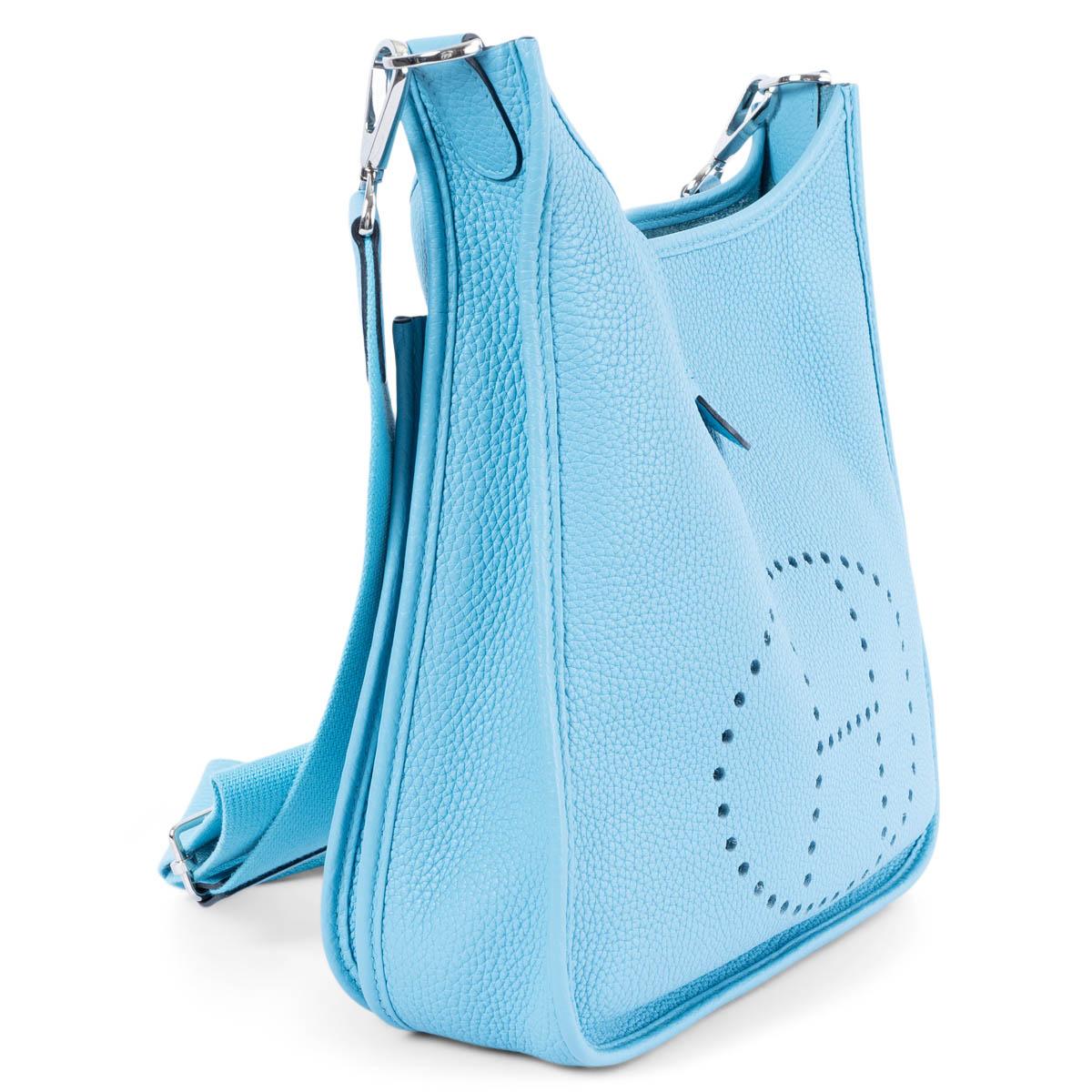 100% authentic Hermès Evelyne III 29 crossbody bag in Bleu du Nord (sky blue) Taurillon Clemence leather. Adjustable canvas shoulder strap. Open pocket on the back. Closes with a snap button on top. Unlined. Has been carried and is in virtually new